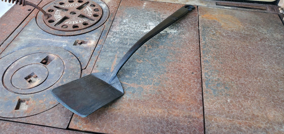 Hand forged single piece steel spatula