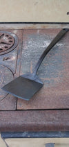 Hand forged single piece steel spatula