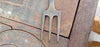 Carved trident fork